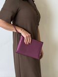 Load image into Gallery viewer, Metallic Logo Leather Clutch