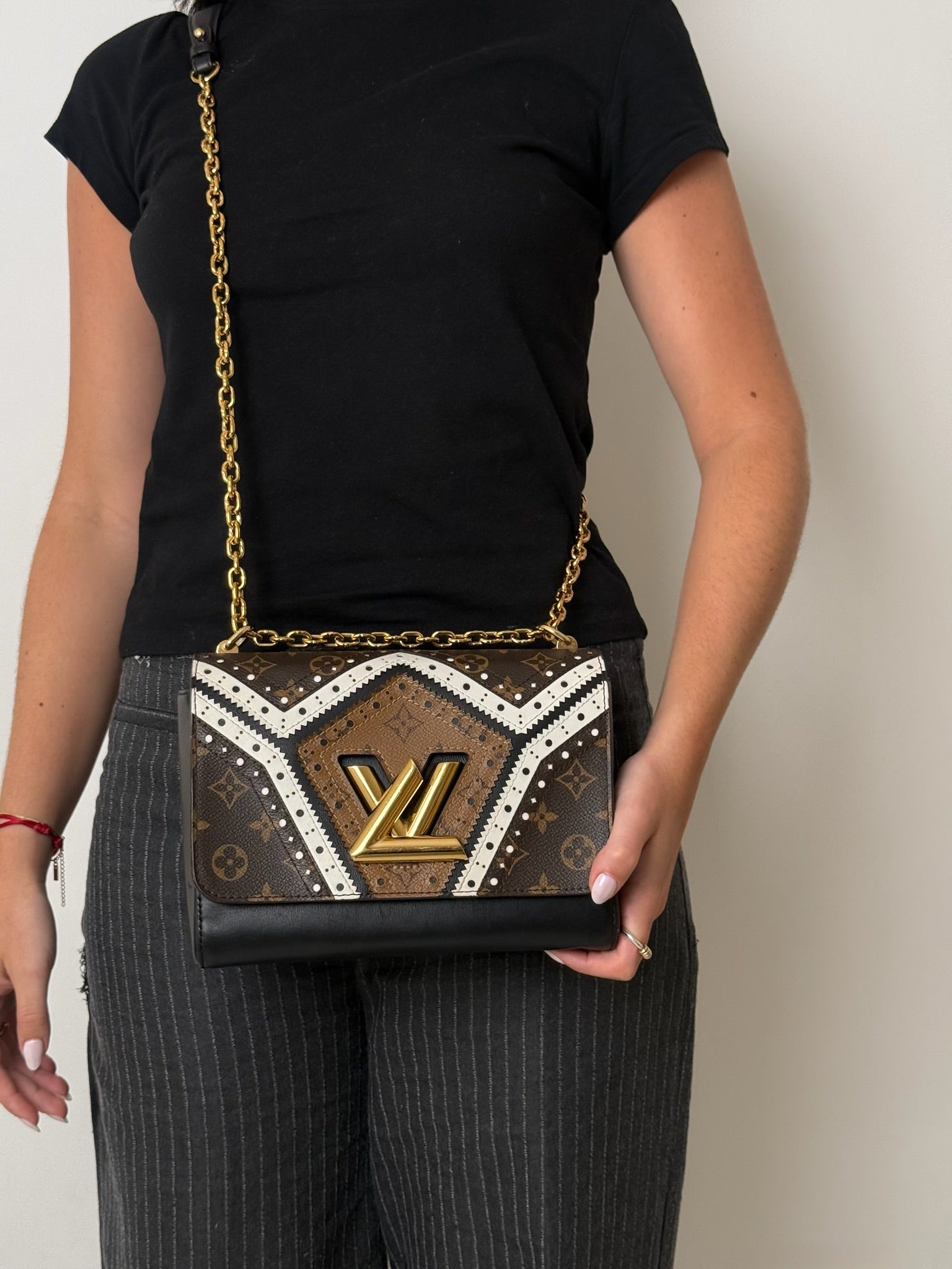 TWIST MM  LIMITED EDITION REVERSE MONOGRAM BROGUE BAG