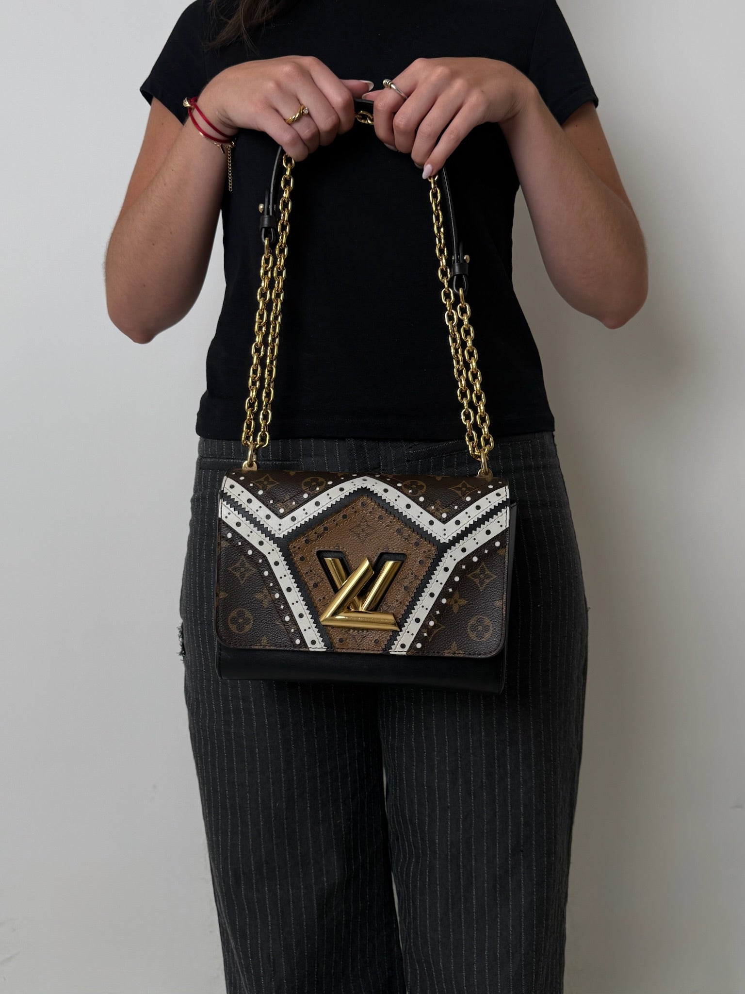 TWIST MM  LIMITED EDITION REVERSE MONOGRAM BROGUE BAG