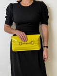 Load image into Gallery viewer, PATENT LEATHER BRIGHT BIT CLUTCH
